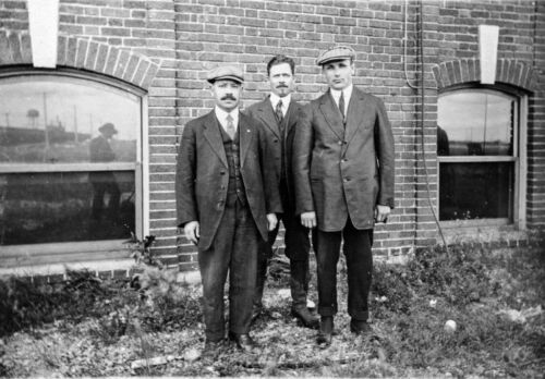 Left-to-right-Israel-Slotin-David-Spivak-and-Harry-Feinstein-in-front-of-Winnipeg-Livestock-Exchange-1920